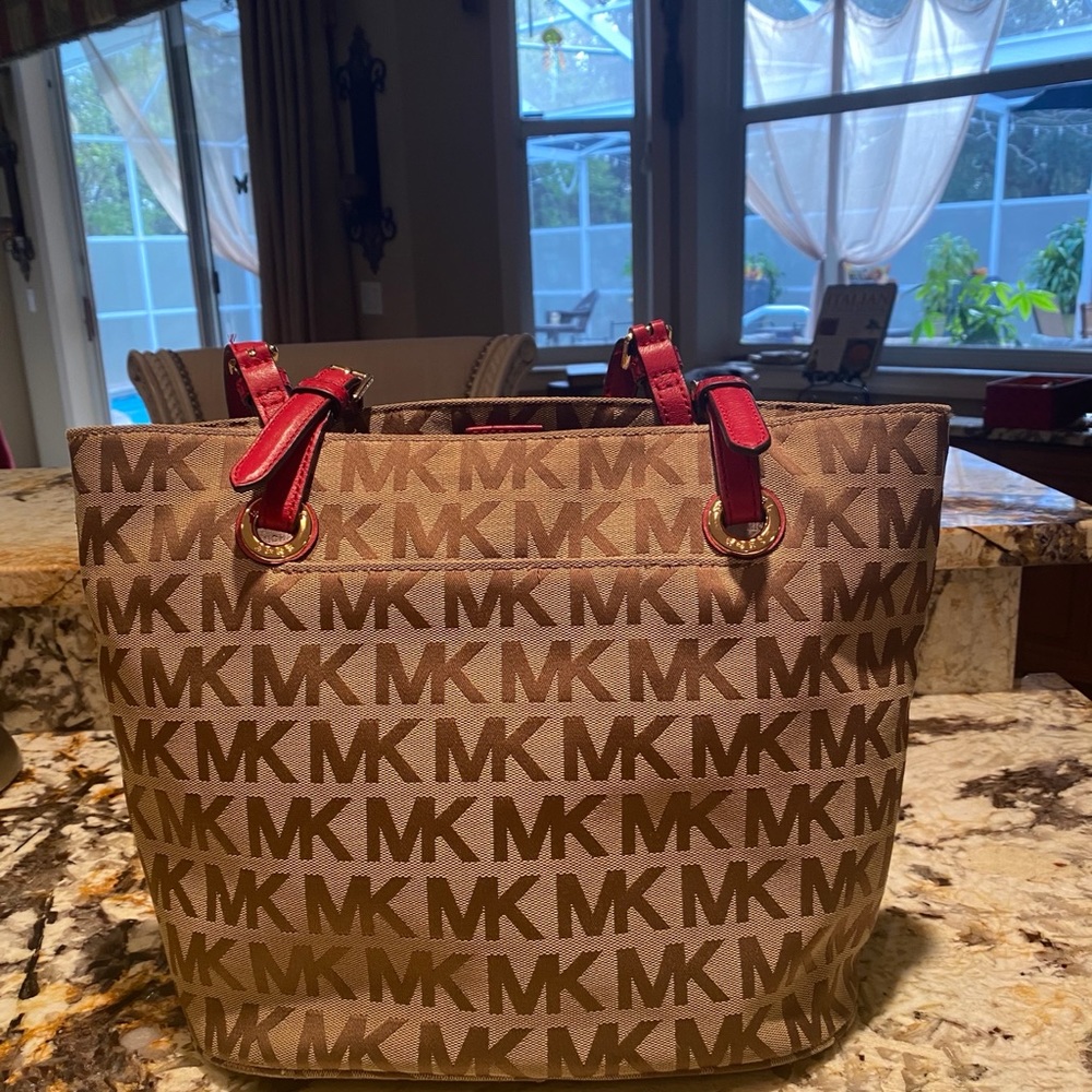 Michael Kors “Jet Set“ tote. Tan with red straps